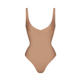 SKIMS BODY UNLINED PLUNGE THONG BODYSUIT | SIENNA